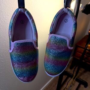 28.  No name brand kids slip on shoes size 2